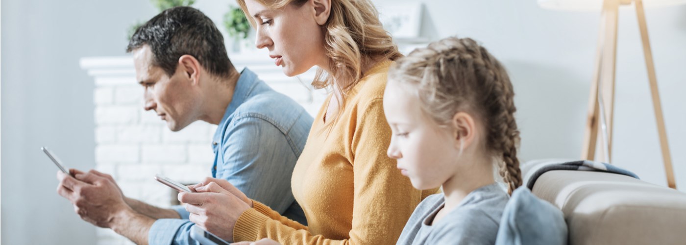 Family all on their phones
