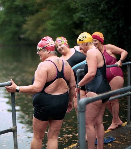 A group of middle aged ladies wild river swimming