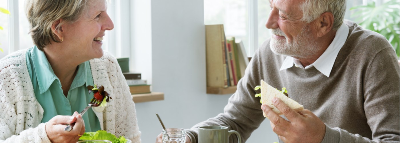 older couple eating healthy food