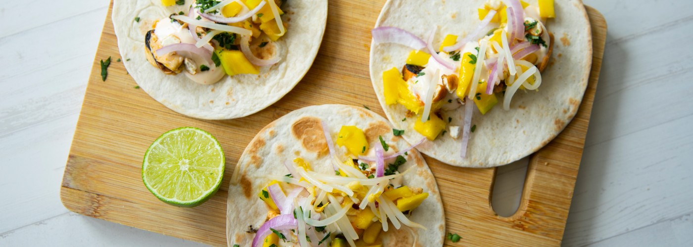 Tasty mango chicken wrap with red pepper dish