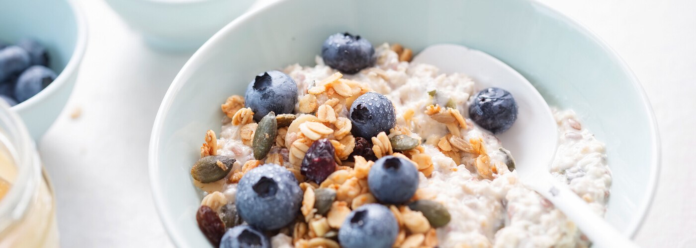 A nutritious oatmeal with blueberries and nuts to keep regular bowel movements