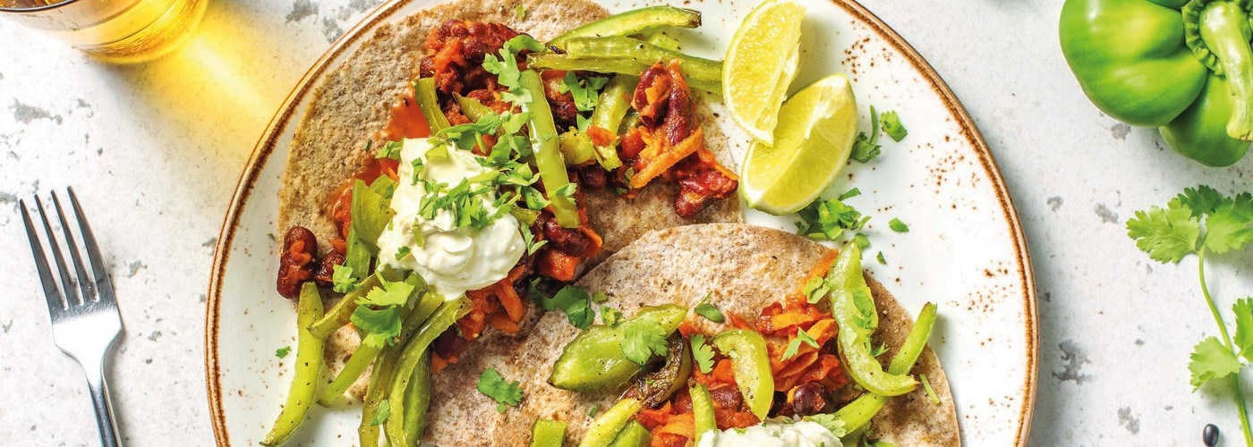 Veggie tostadas with roasted peppers and zesty crema
