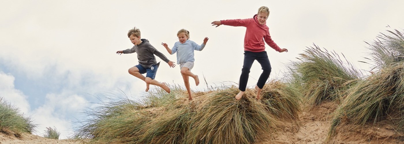Family enjoying their time on the beach