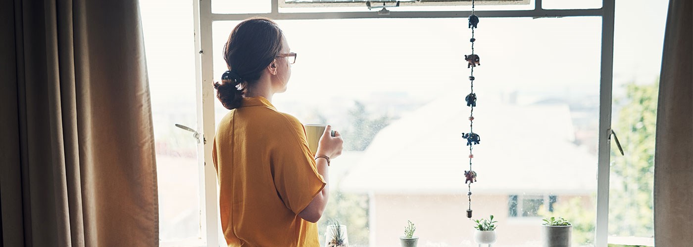 Woman looking out of the window