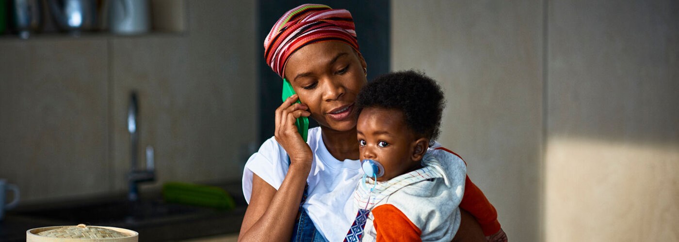 mother with baby calling GP