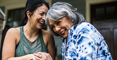 Two ladies sharing a laugh